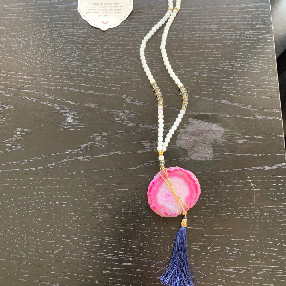Rapsodia necklace with tags.